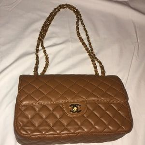 Brown tan with gold quilted purse
